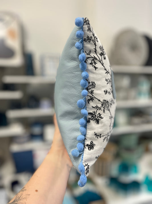 Light Blue Leather Happy Cushion.