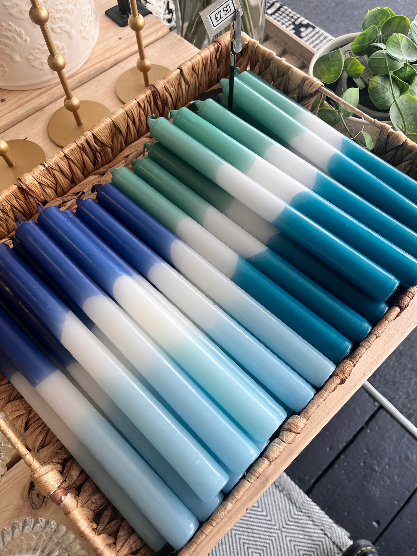 Taper candle in hues of green and blue