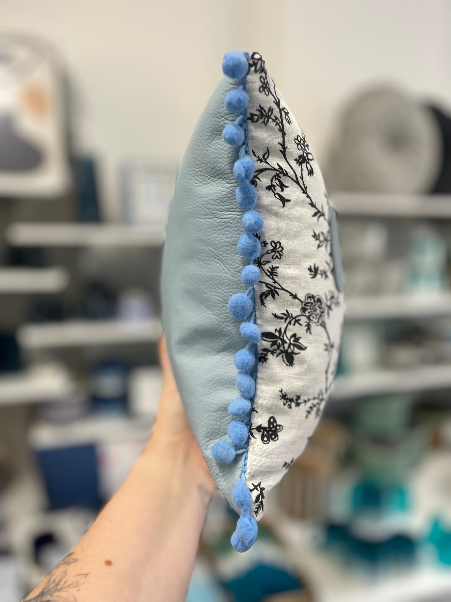 Light Blue Leather Happy Cushion.