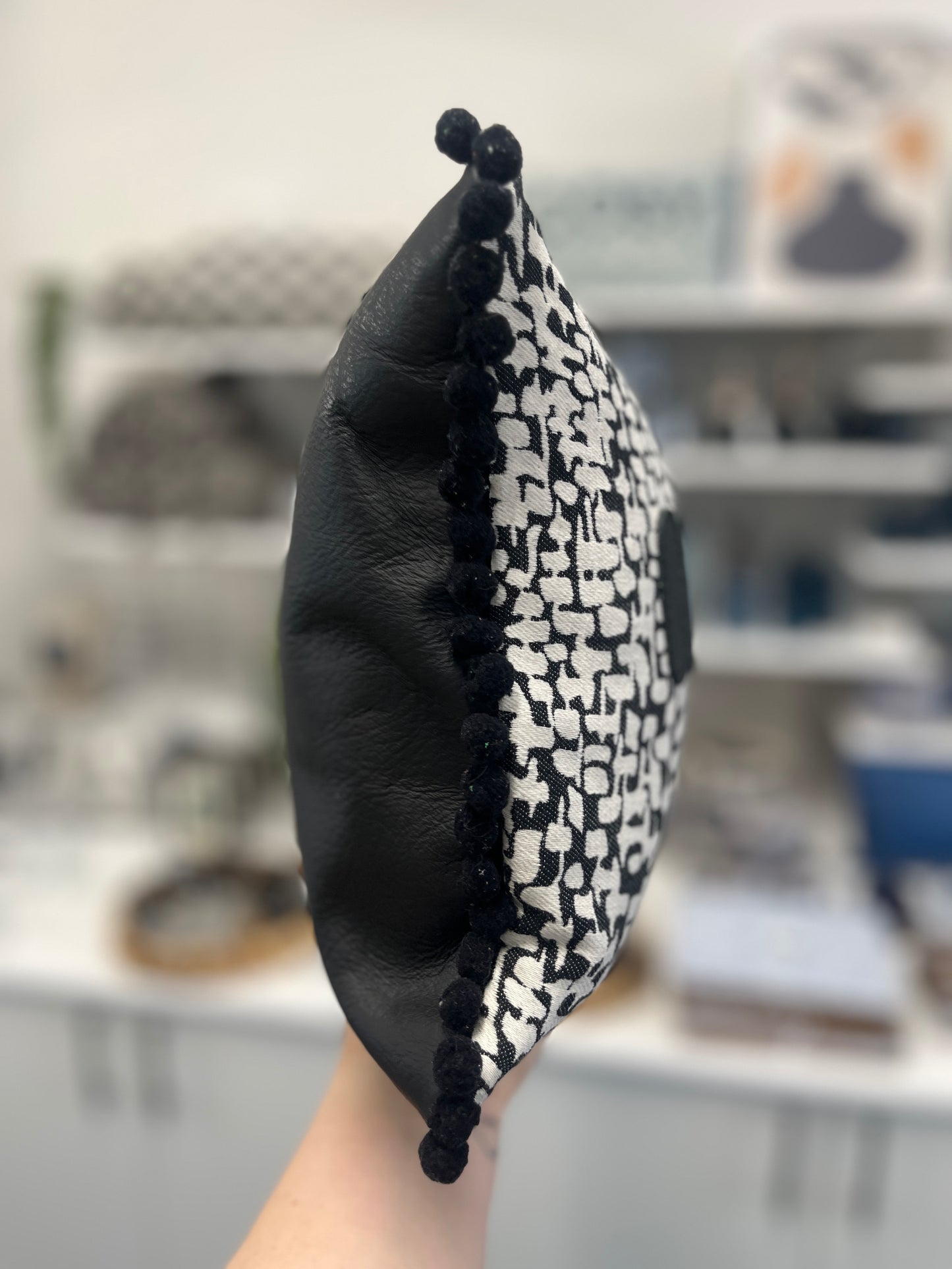 Black Leather Happy Cushion.