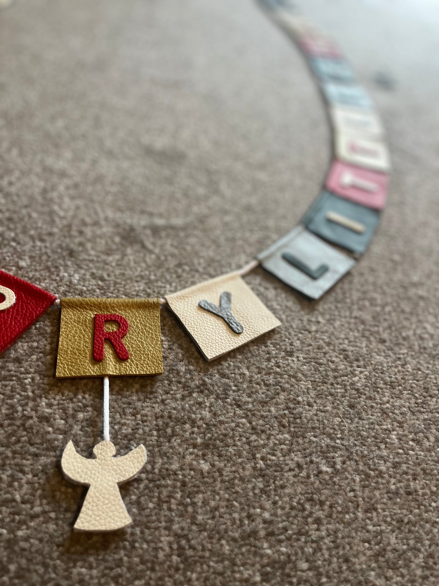 Have Yourself A Very Merry Christmas Bunting With Hanging Christmas Motifs.