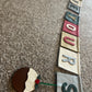 Have Yourself A Very Merry Christmas Bunting With Hanging Christmas Motifs.