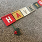 Have Yourself A Very Merry Christmas Bunting With Hanging Christmas Motifs.