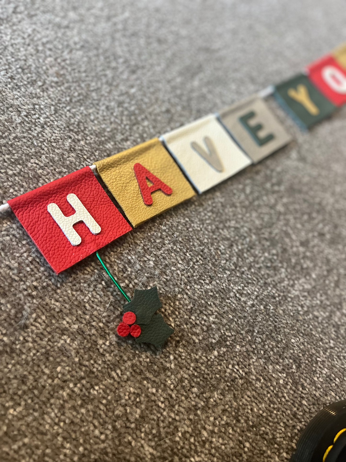 Have Yourself A Very Merry Christmas Bunting With Hanging Christmas Motifs.